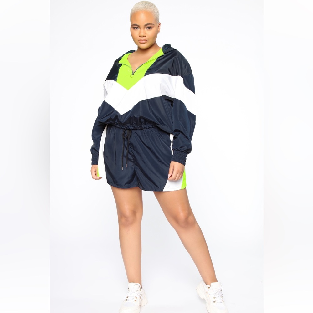 Sold together! Never worn two piece set. Shorts and windbreaker together.
